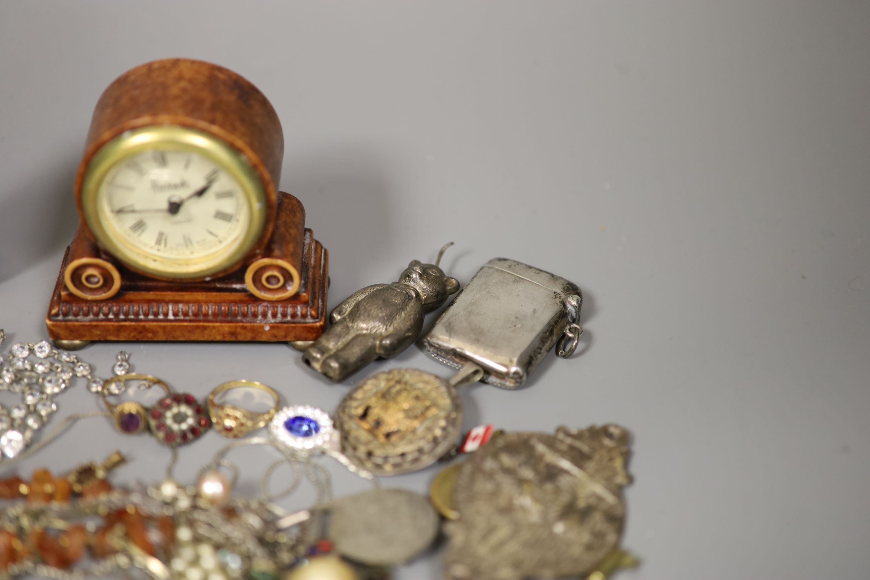 An early 20th century 18ct and garnet cluster set ring, size O/P, gross 2.9 grams, a 9ct gold and amethyst ring, gross 1.4 grams and a small group of collectable including costume jewellery.